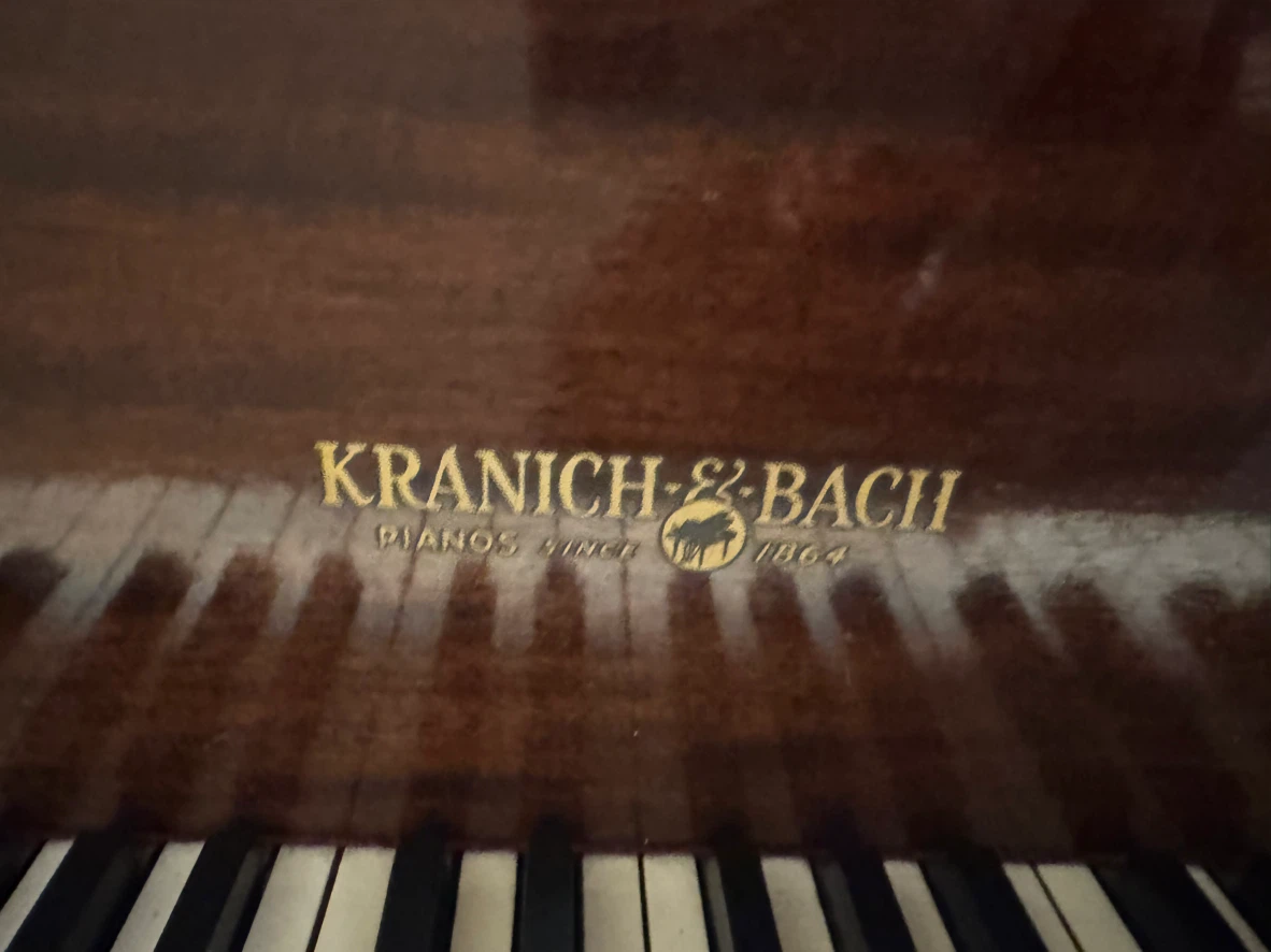 Kranich and Bach baby grand piano