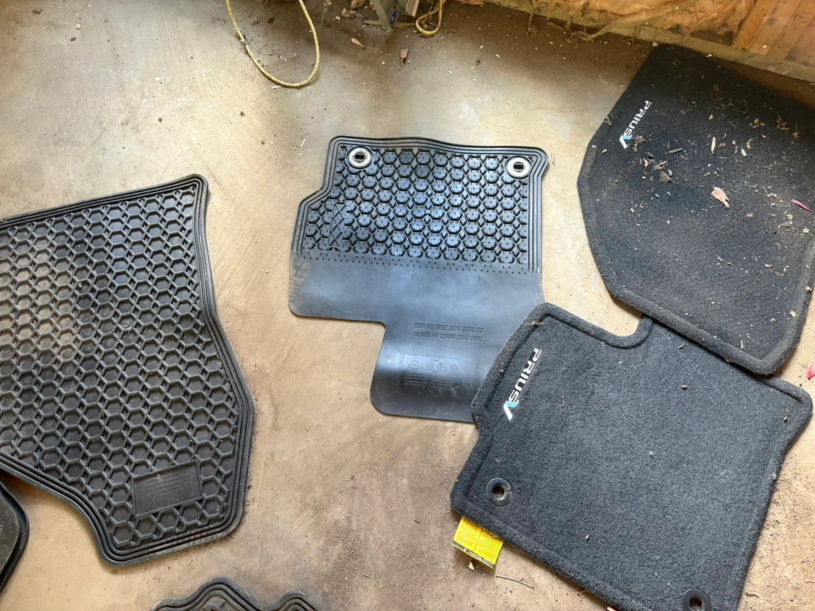 Prius V - Toyota brand mats (front, rear, cargo) and hubcaps - photo 3