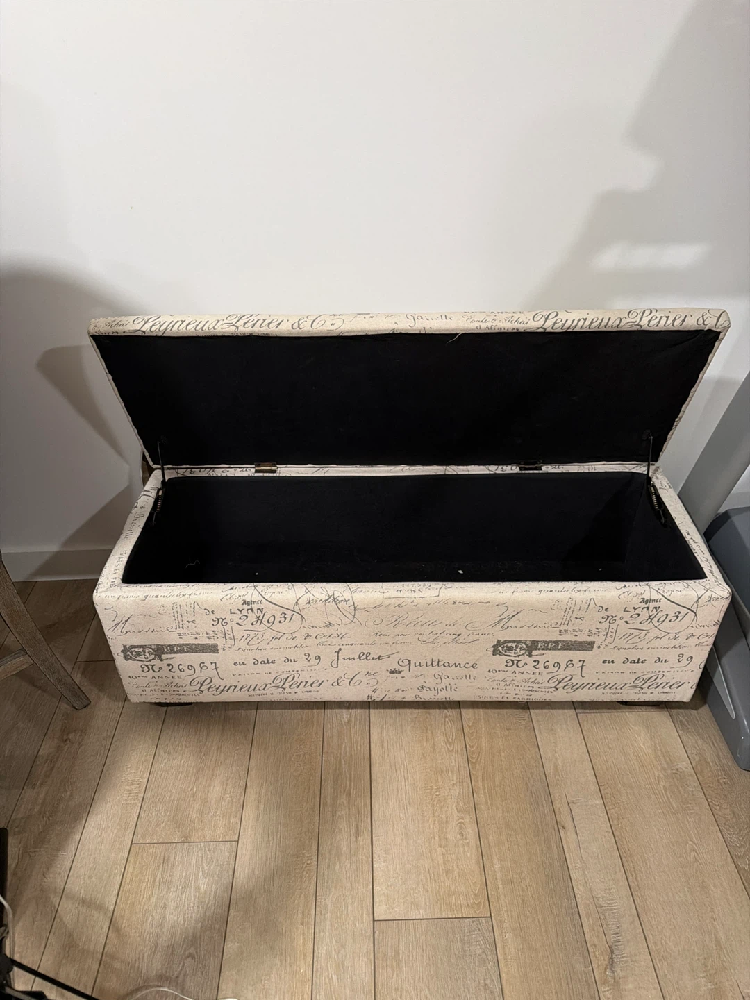 Storage Ottoman with French Script Design
