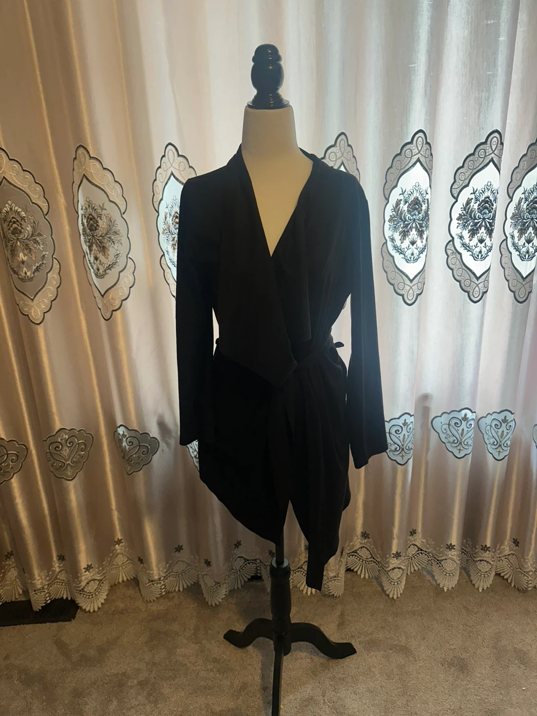 Black asymmetrical wrap dress