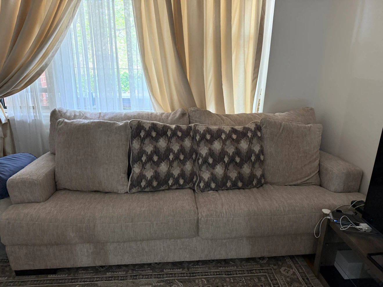 Light Beige Sofa with Decorative Pillows