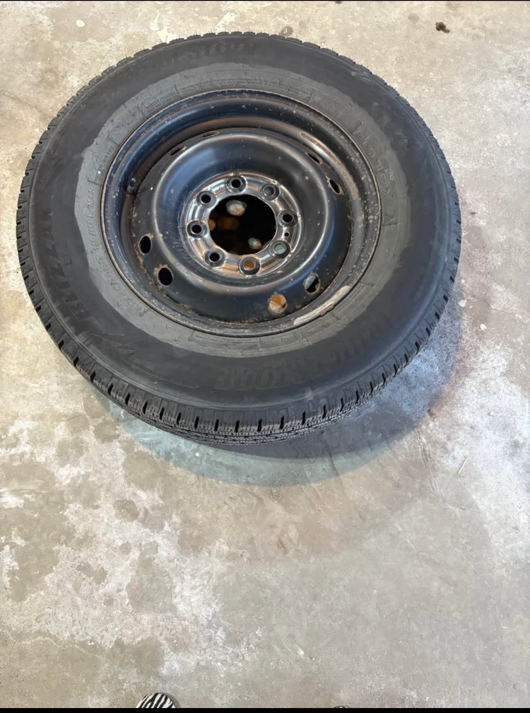 Bridgestone Blizzak LT245/70R17 Tire with Rim