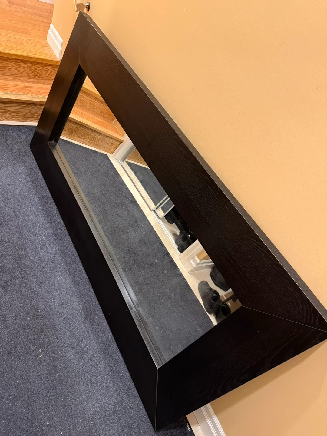 Large dark wood frame mirror