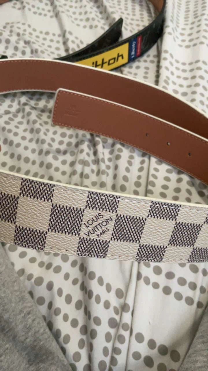 Louis Vuitton white Damier Azur belt.