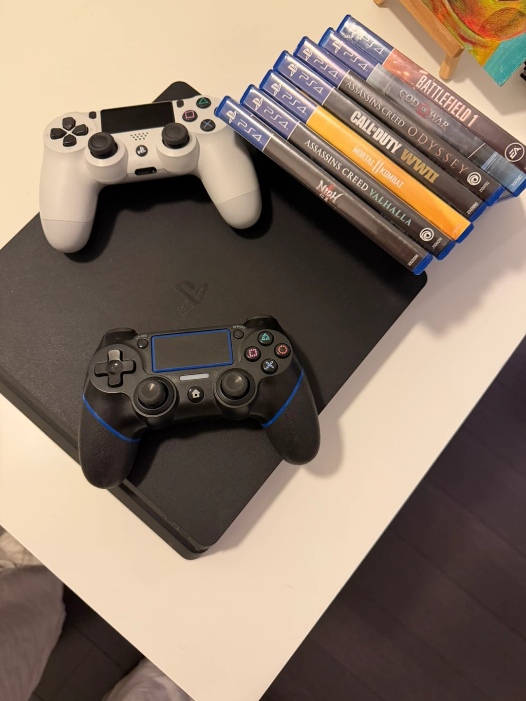 Sony PlayStation 4 Slim Console with Games and Controllers