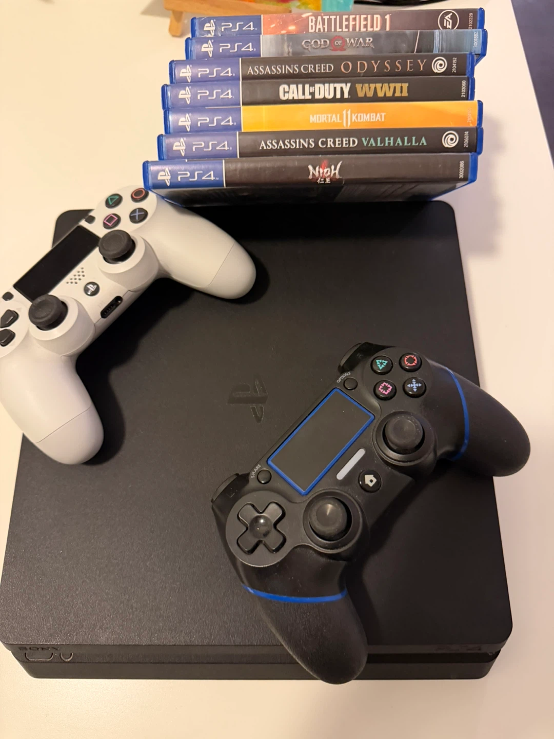 Sony PlayStation 4 Slim Console with Games and Controllers - photo 3