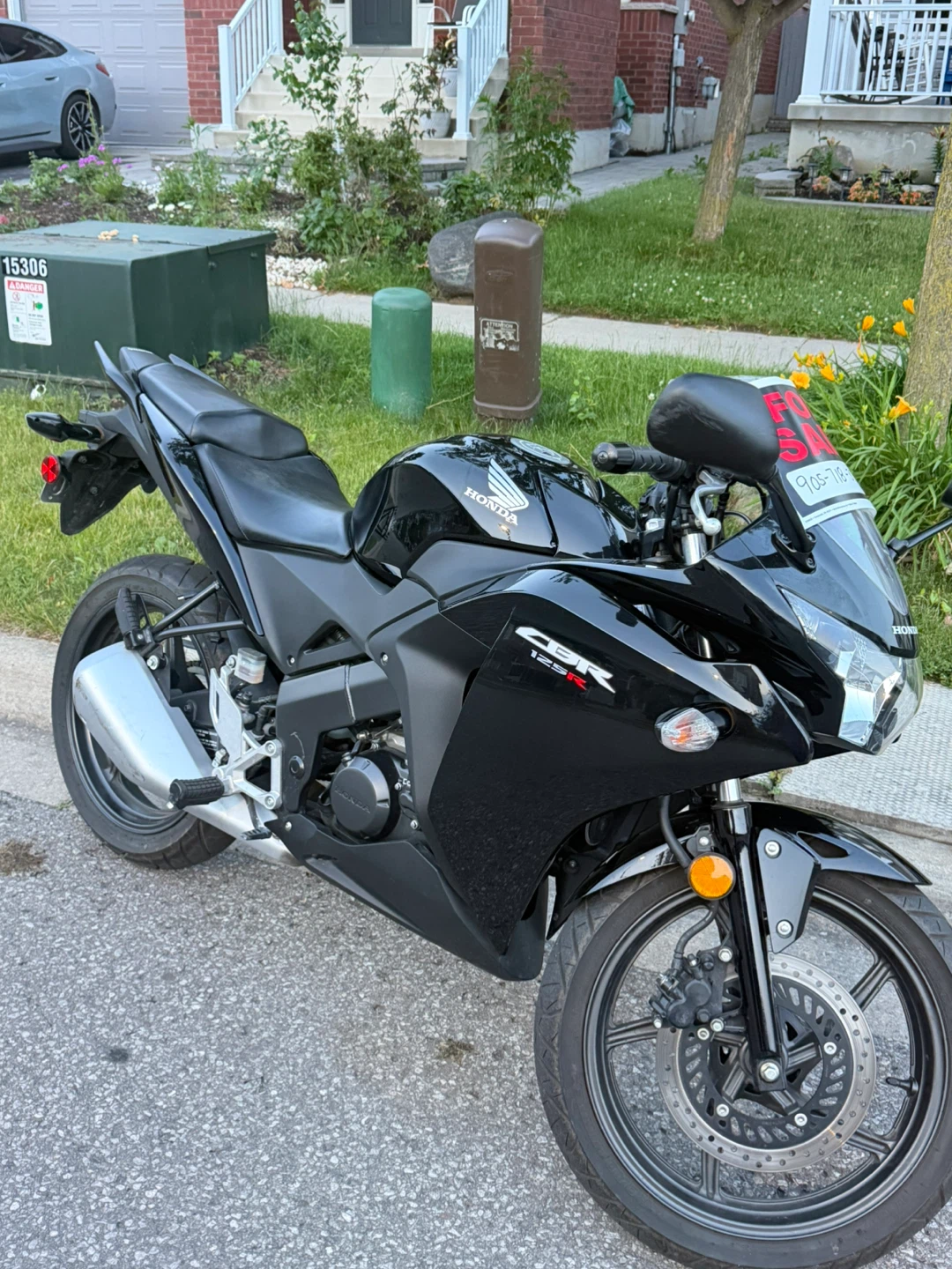 Black Honda CBR 125R Motorcycle