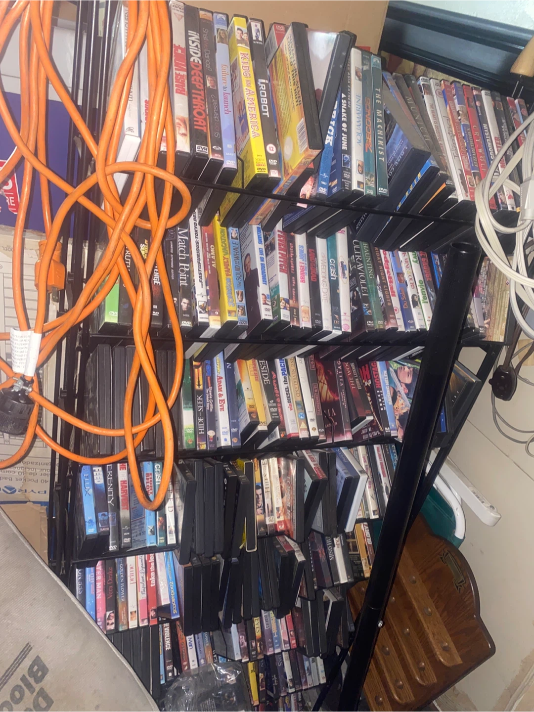 Assorted DVD Movies with stand