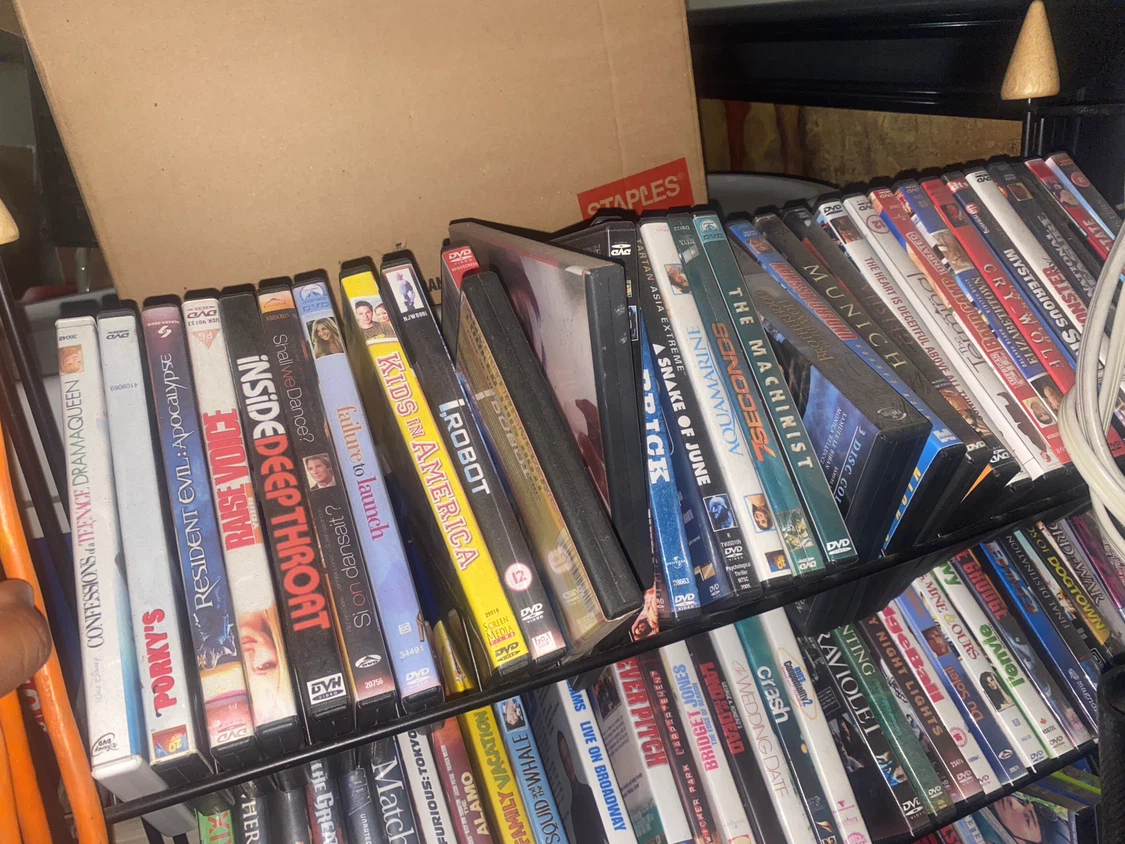 Assorted DVD Movies with stand - photo 2