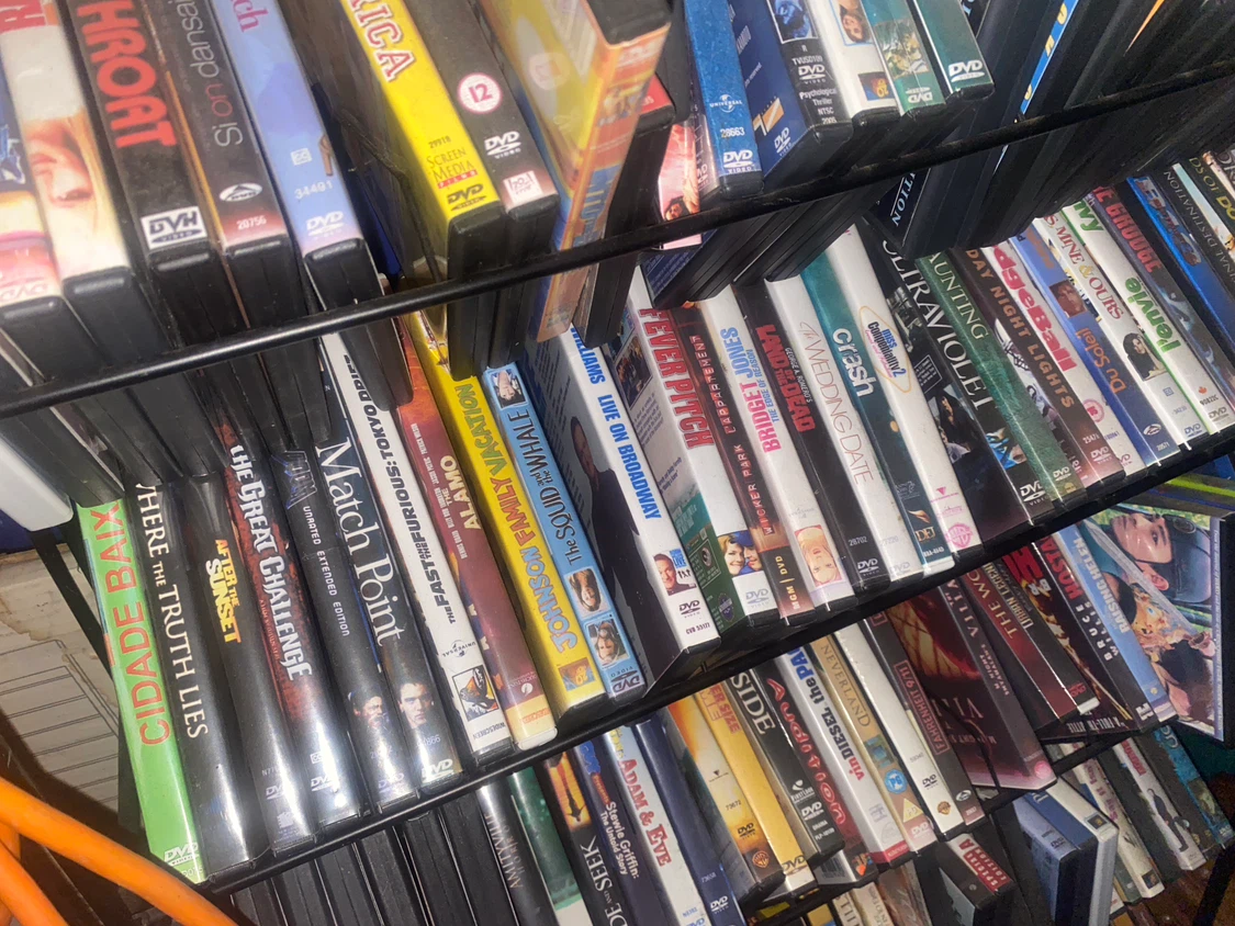 Assorted DVD Movies with stand - photo 3
