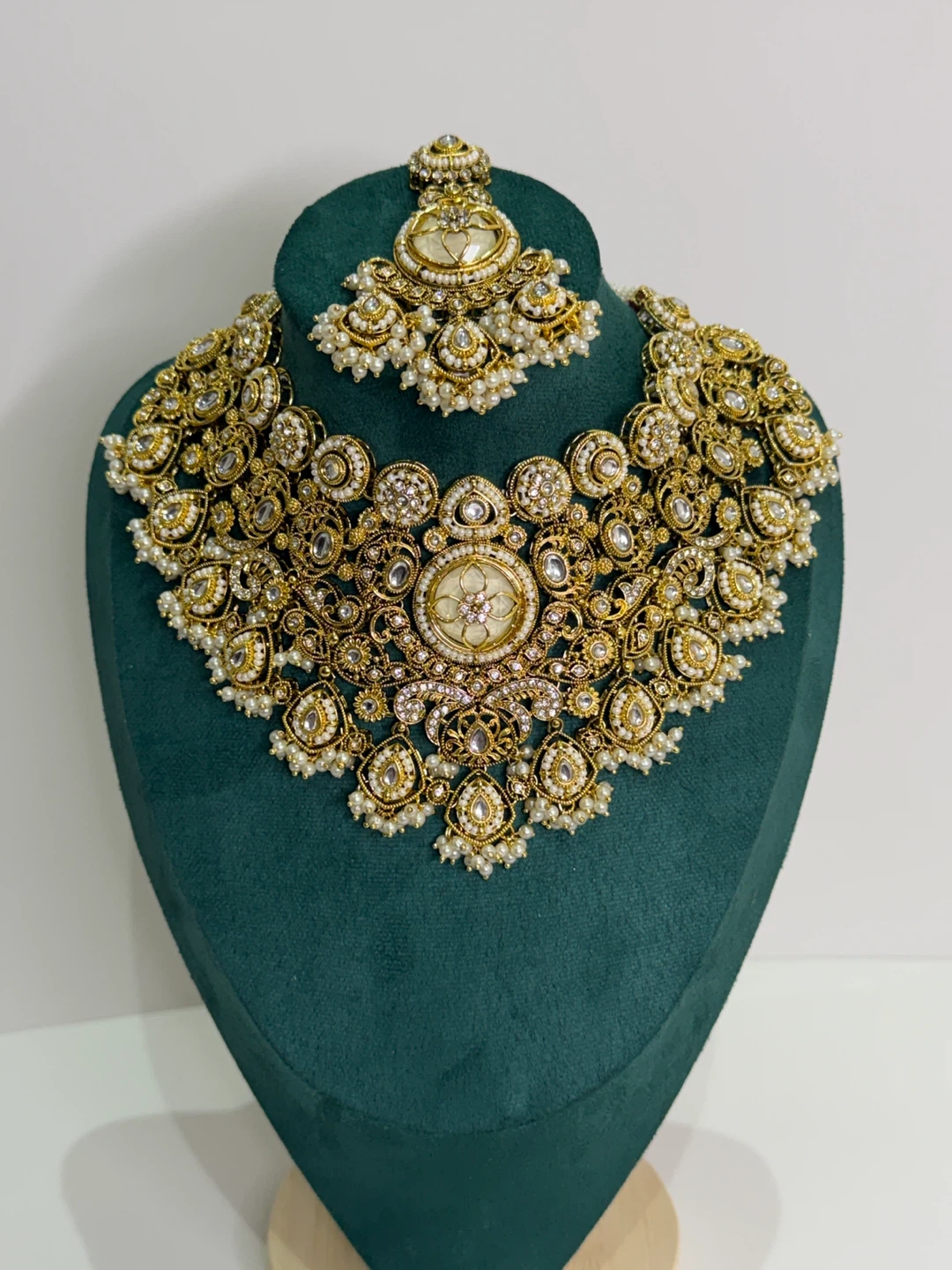 Gold and Pearl Bridal Jewellery Set with Earrings and Tikka