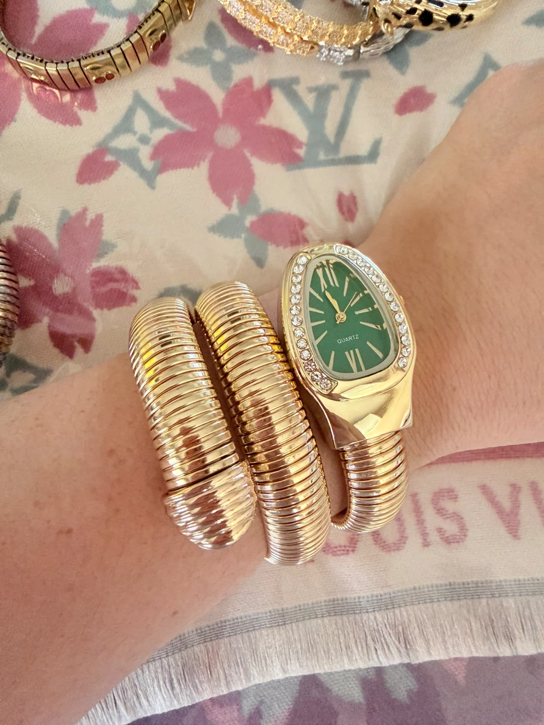 Gold Tone Snake Watch with Rhinestone Bezel