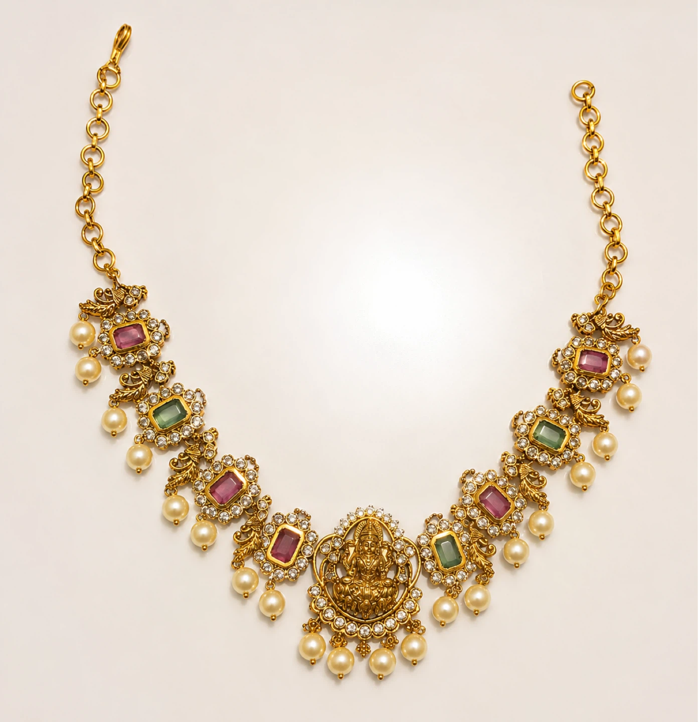 Gold-tone necklace with pearls and coloured stones