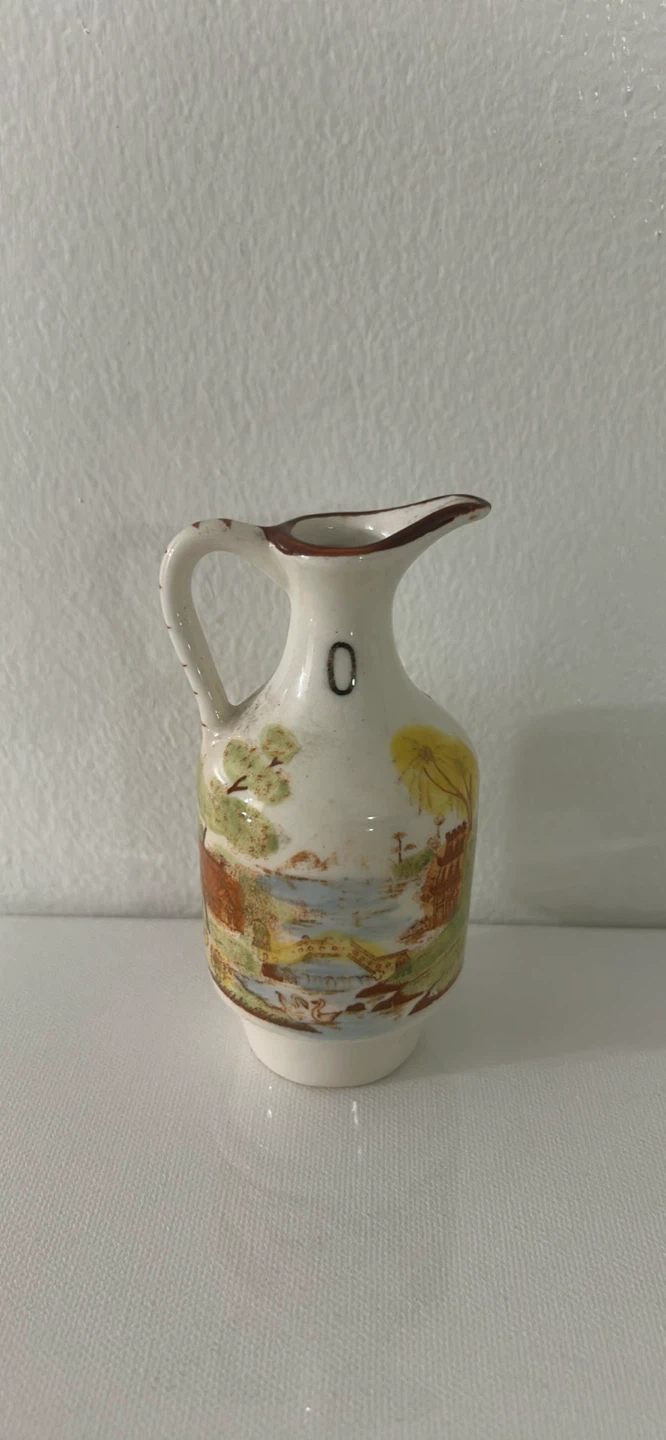 Decorative Ceramic Pitcher with Landscape Scene