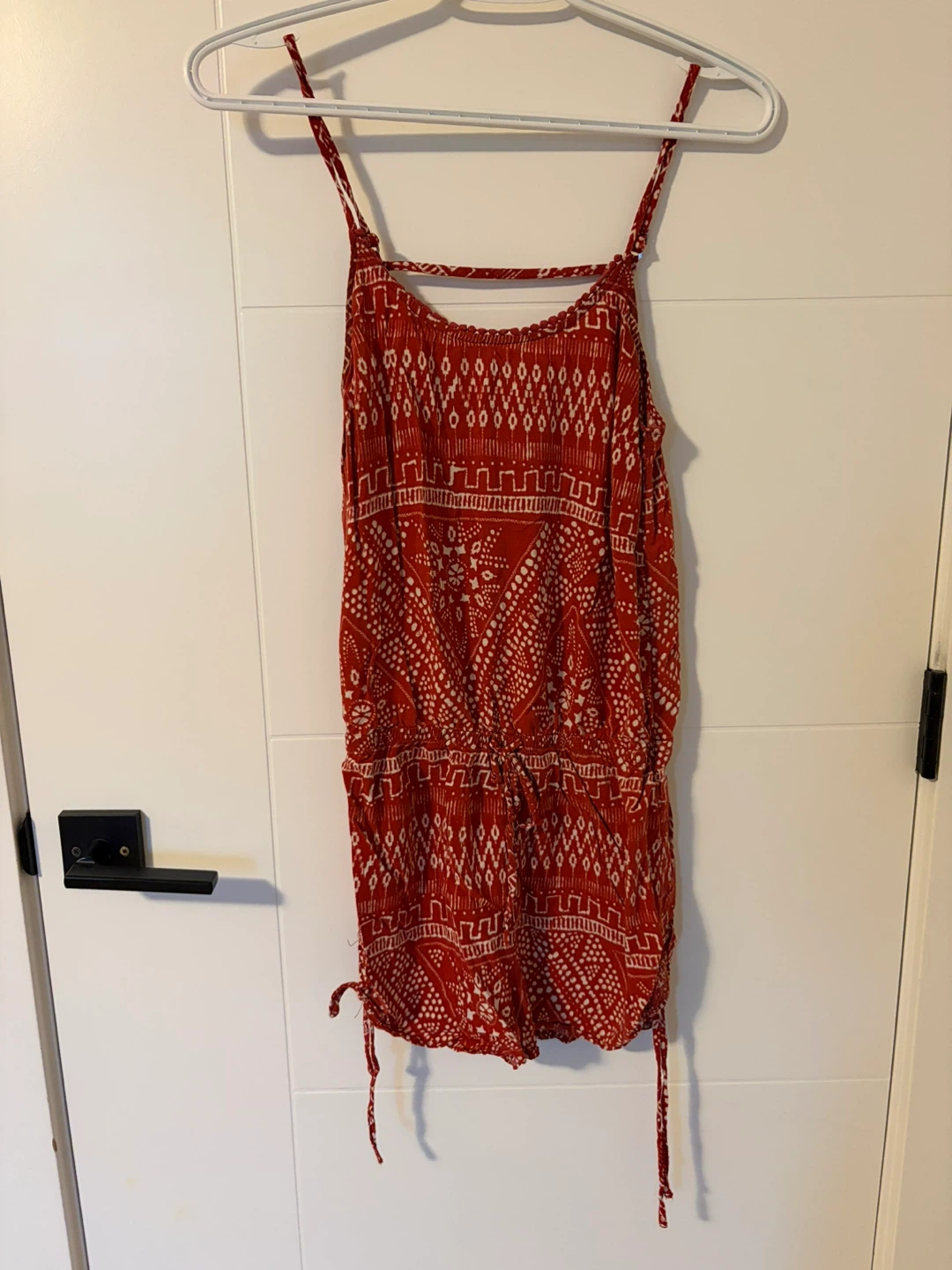 Red and white patterned romper