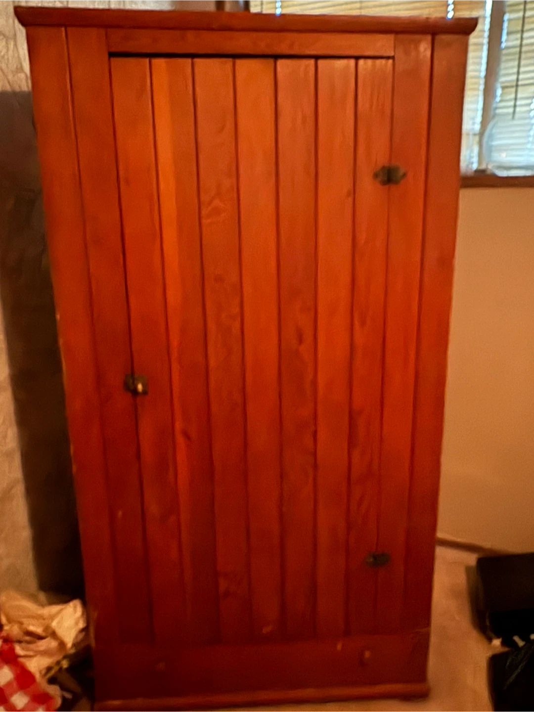 Wooden wardrobe cabinet with double doors and drawer