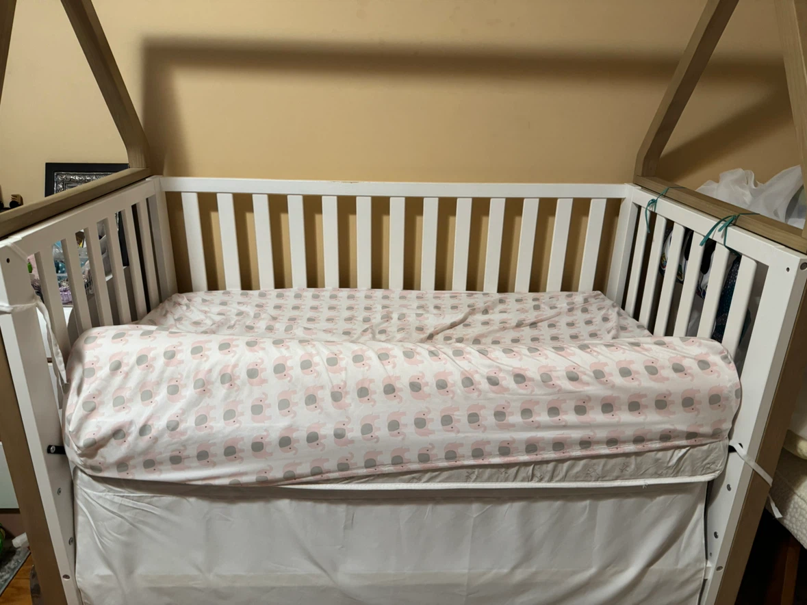White Convertible Crib with Wooden Accents