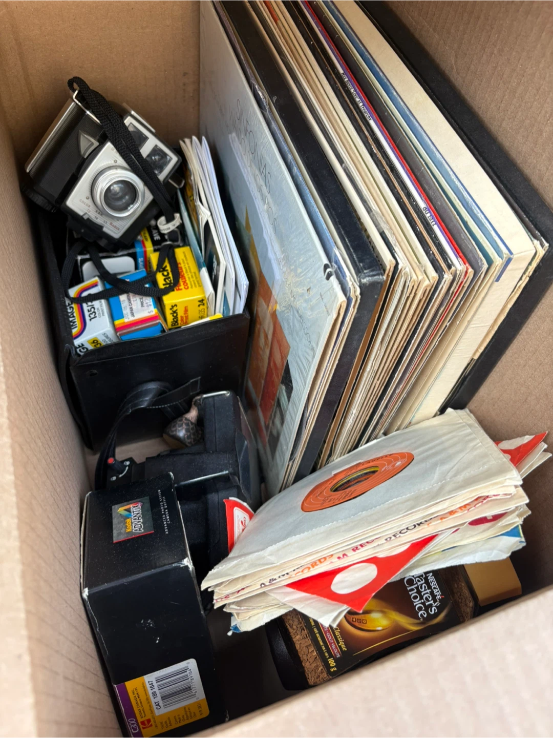 Lloyds Record Player with Vintage Cameras and Vinyl Records