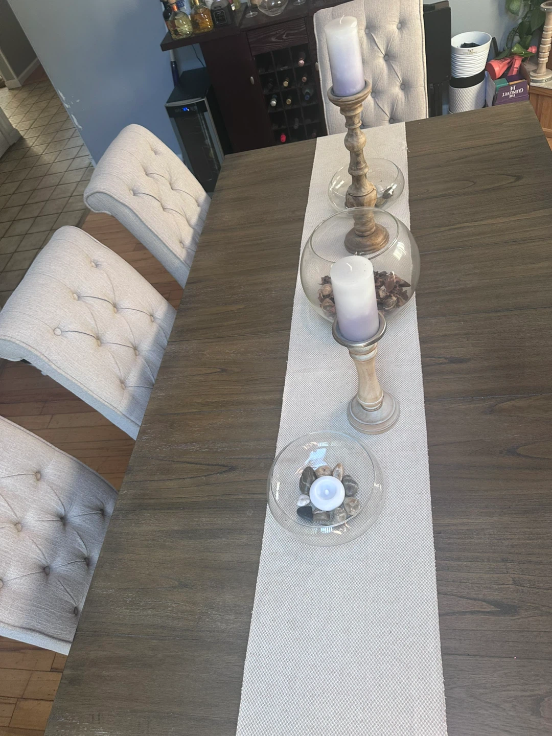 Rustic Wood Dining Table with Tufted Chairs