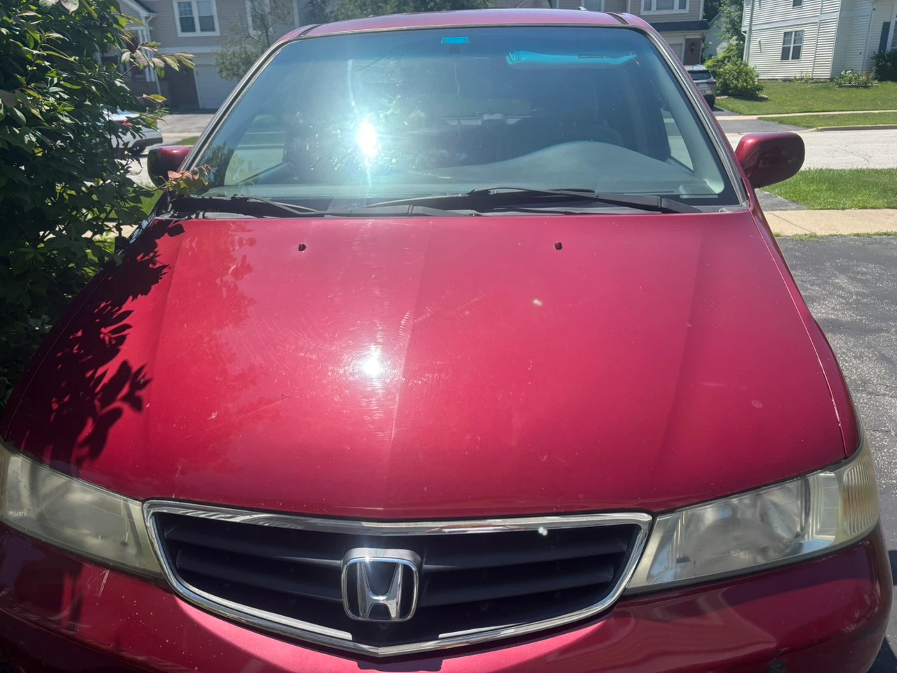 Red Honda Odyssey Minivan