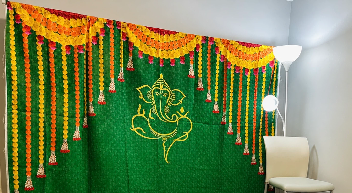 Decorative Ganesha Backdrop with Flower Garlands