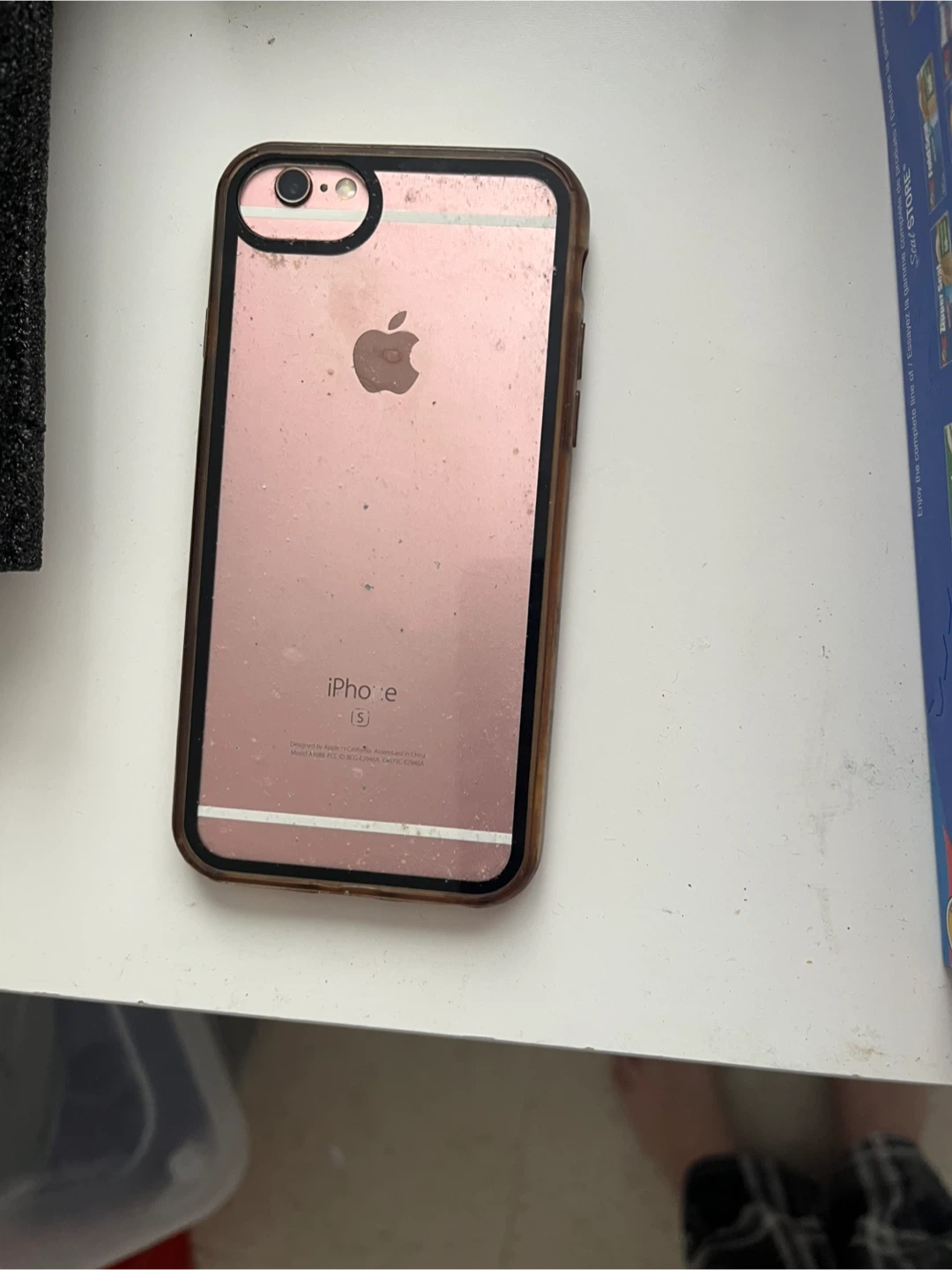 iPhone SE and charger