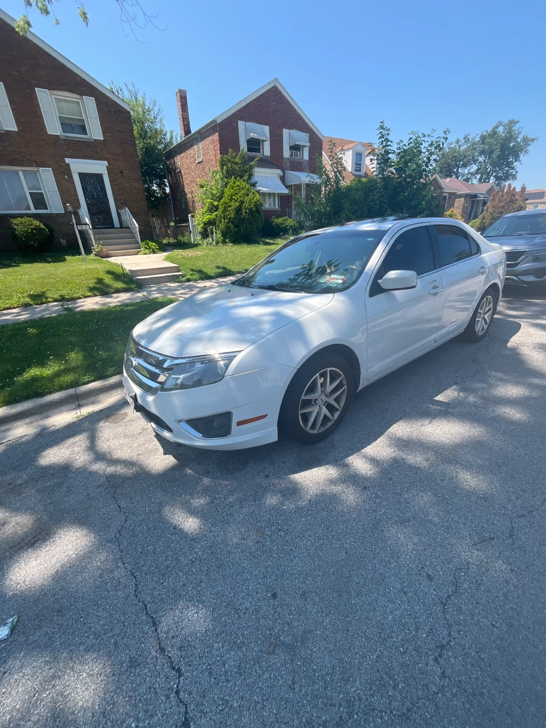 White Ford Sedan