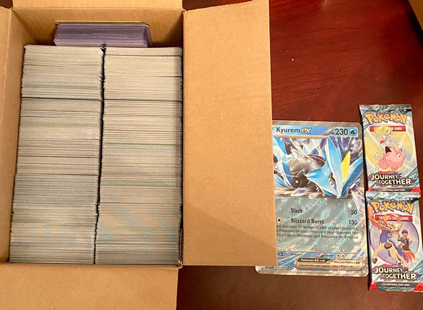 Over 1500 Pokemon cards, 2 Booster Packs & 1 Jumbo Card