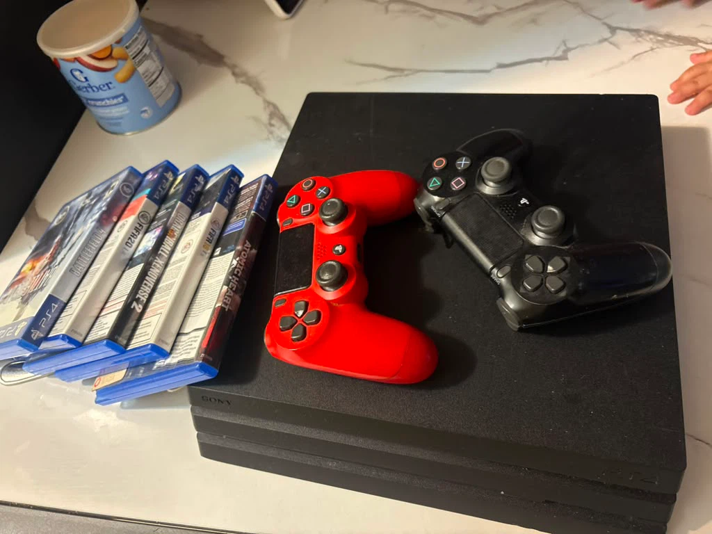 PlayStation 4 Console with 5 Games and 2 Controllers - photo 4