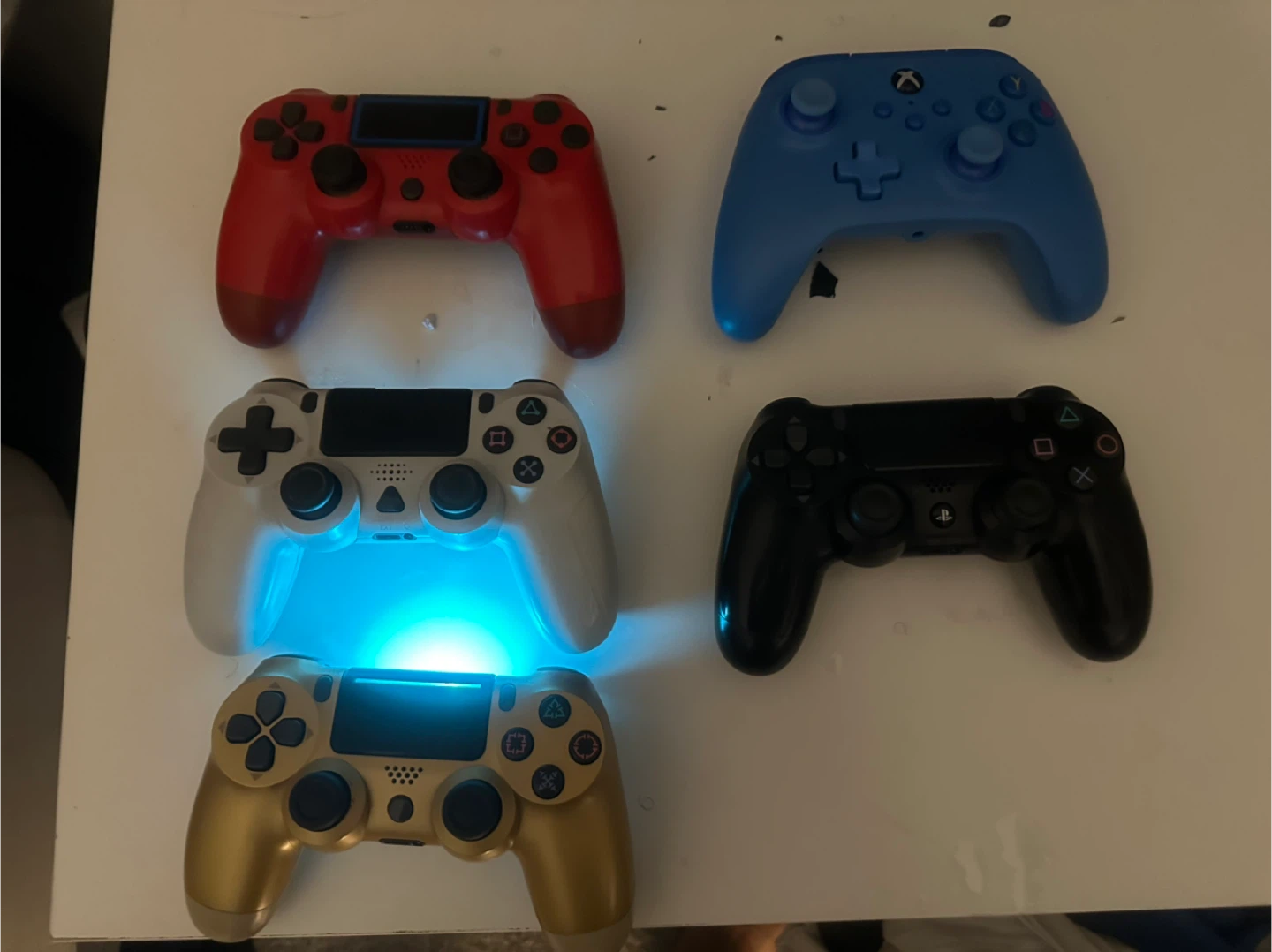 Set of 4 Gaming Controllers (3 PlayStation, 1 Xbox)