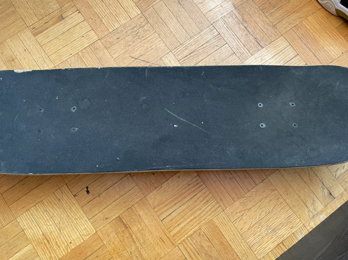 Skateboard with Monster Graphic