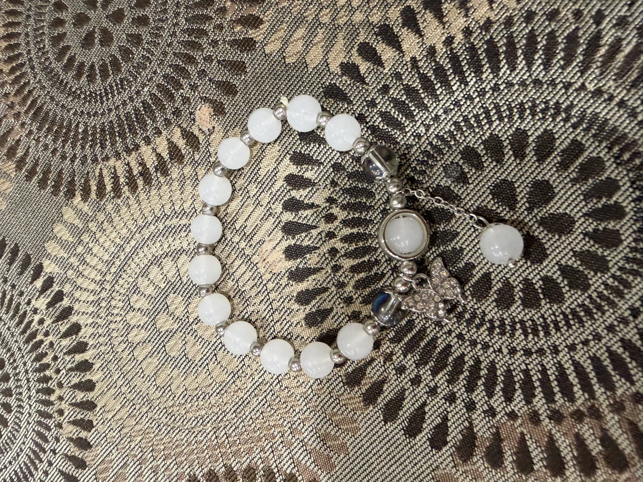 White Beaded Bracelet with Butterfly Charm