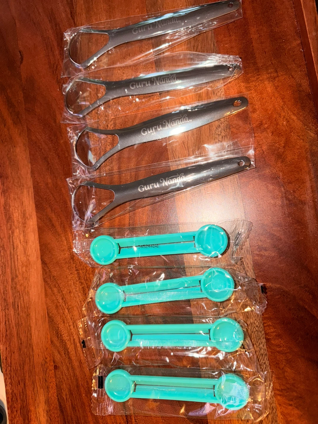 Guru Nanda Tongue Scrapers & Toothpaste Squeezers Set of 4Ea.