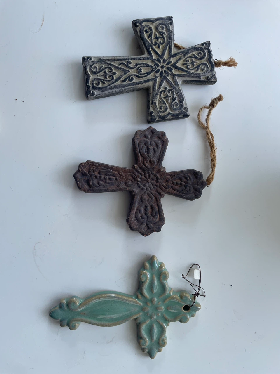 3 small ceramic crosses