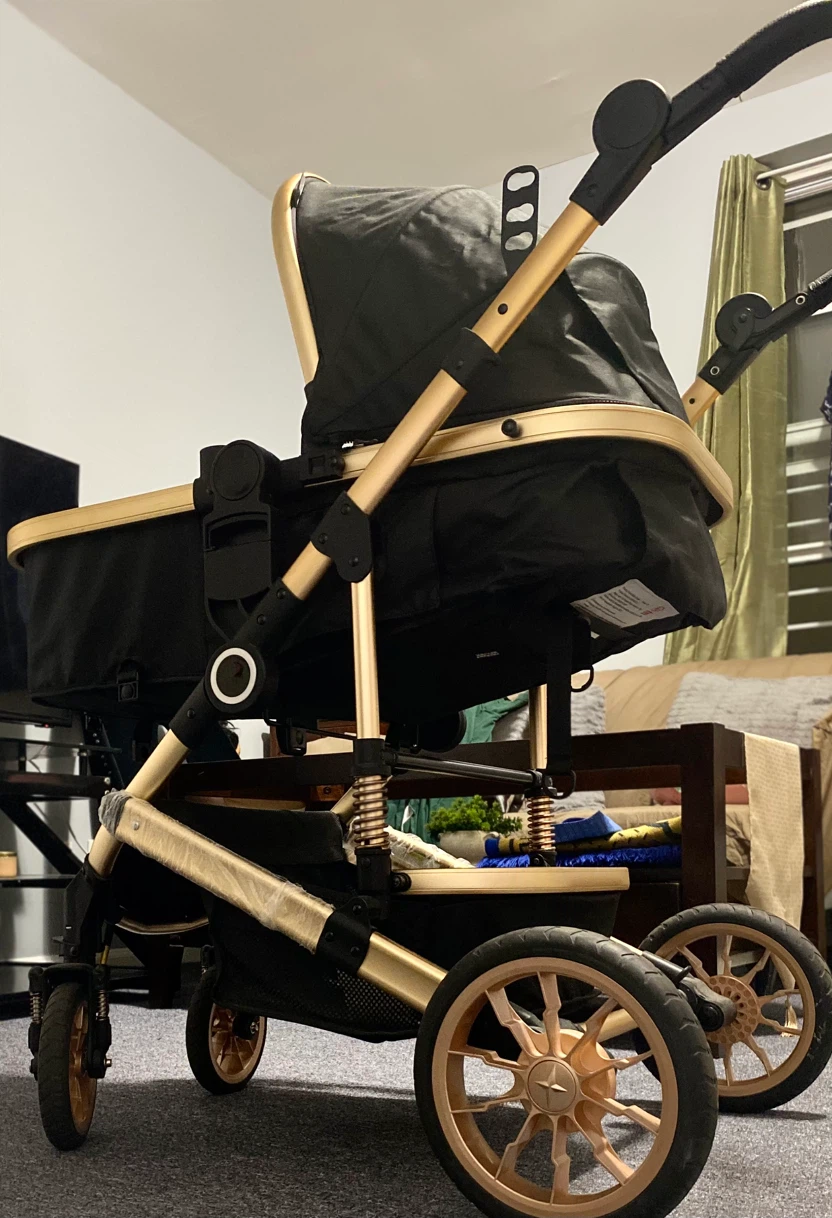 Black Baby Stroller with Gold Accents