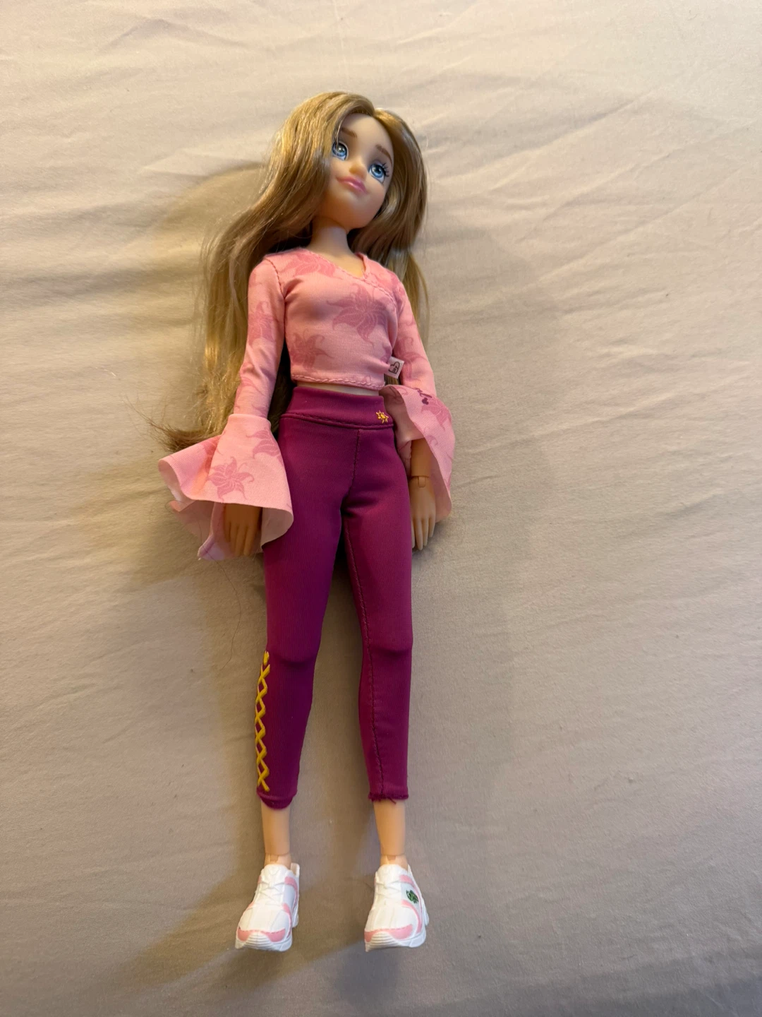 Fashion Doll with Pink Floral Top and Purple Pants