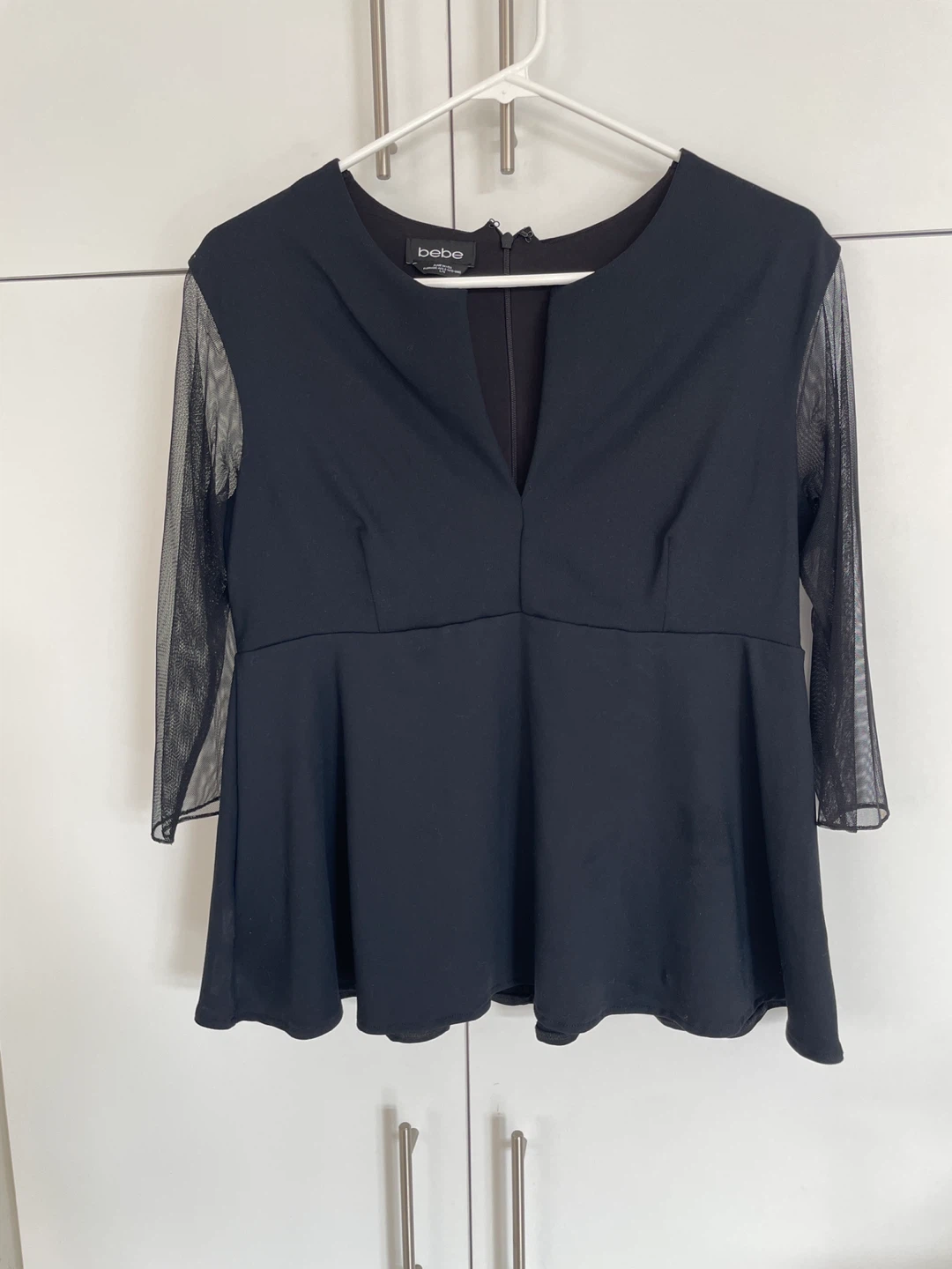 Bebe Black Mesh Sleeve Peplum Top