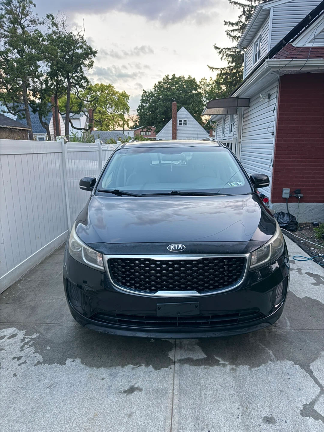 Black 2015 Kia Sedona LX Minivan with 142k miles