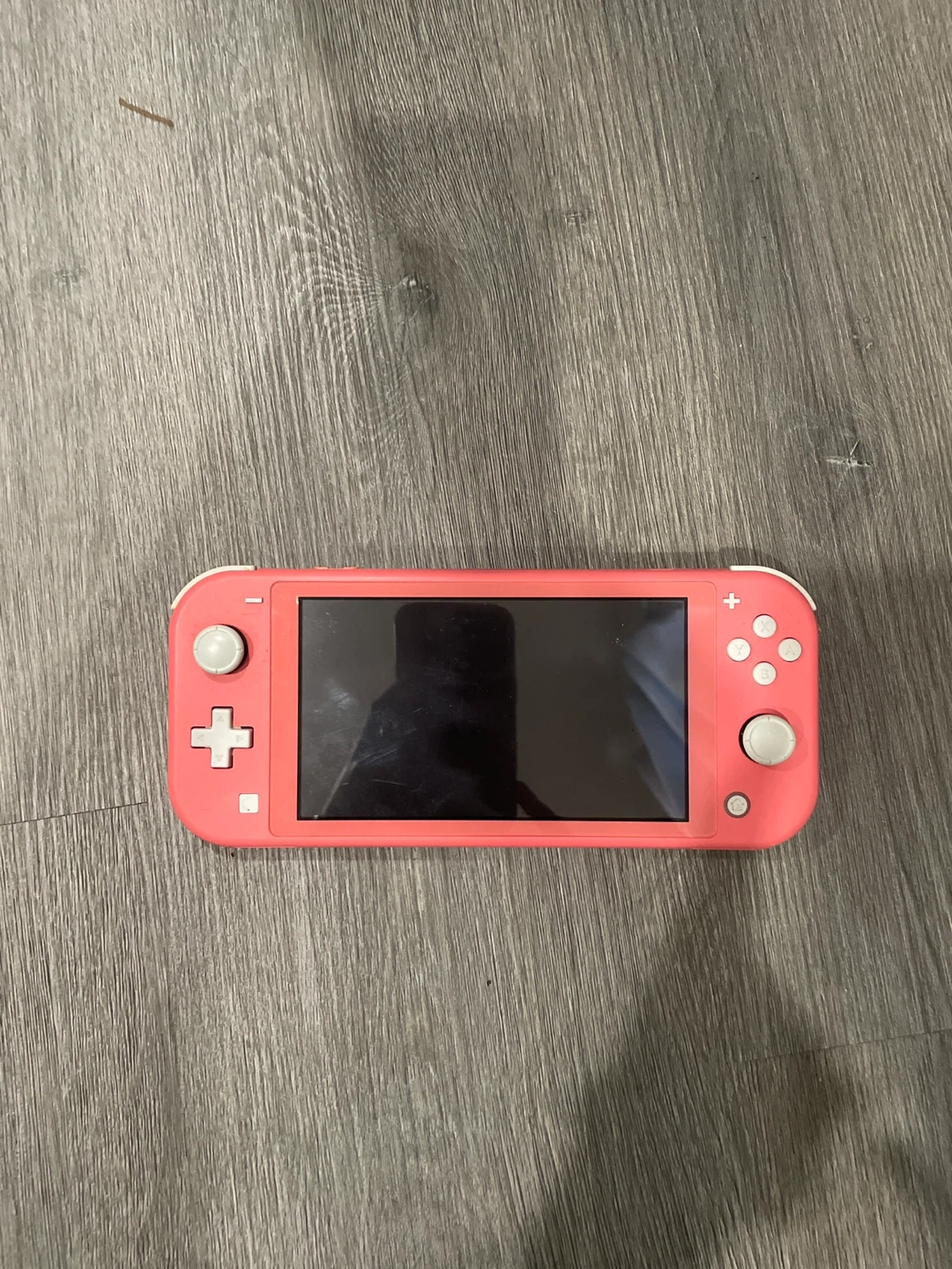 Nintendo Switch Lite Coral (with charger)