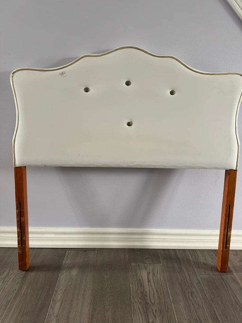 White Upholstered Headboard with Wood Legs