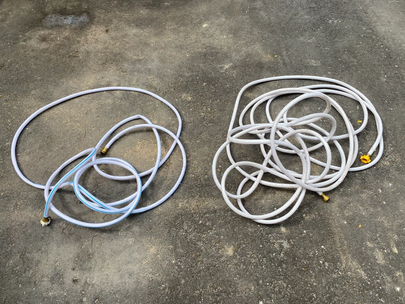Two White Potable water camping hoses