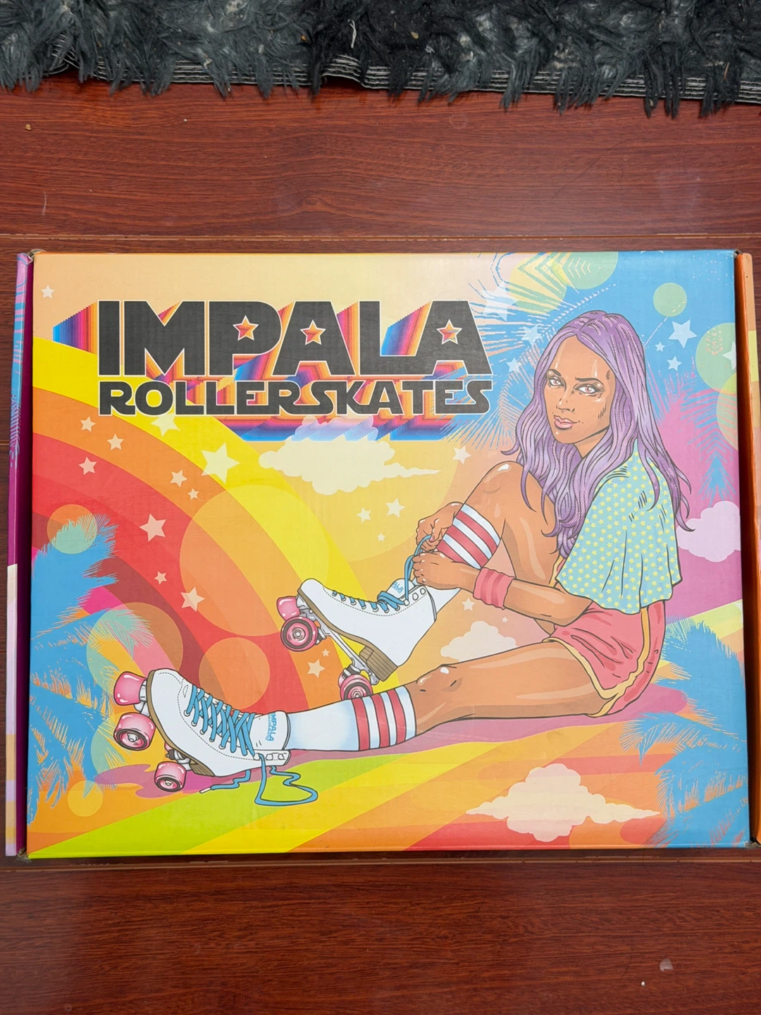 Impala Pink Tartan Roller Skates
