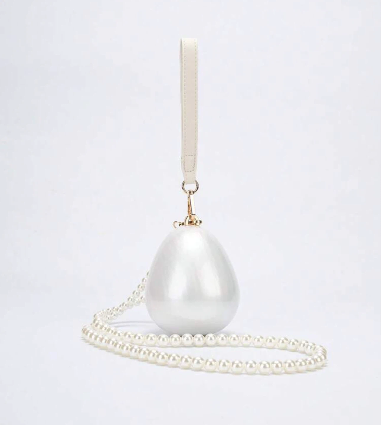 White Egg-Shaped Clutch with Pearl Strap - photo 2