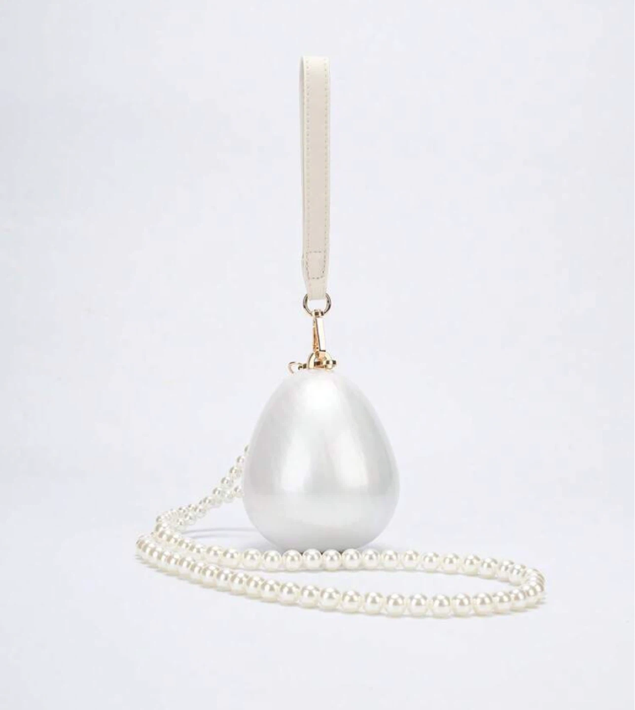 White Egg-Shaped Clutch with Pearl Strap - photo 3