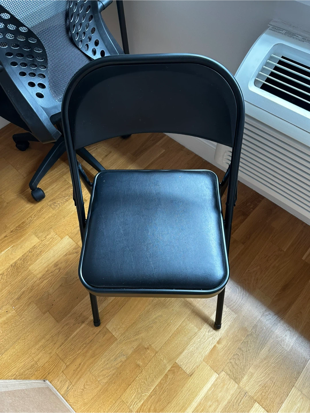 Black Folding Chair with Padded Seat