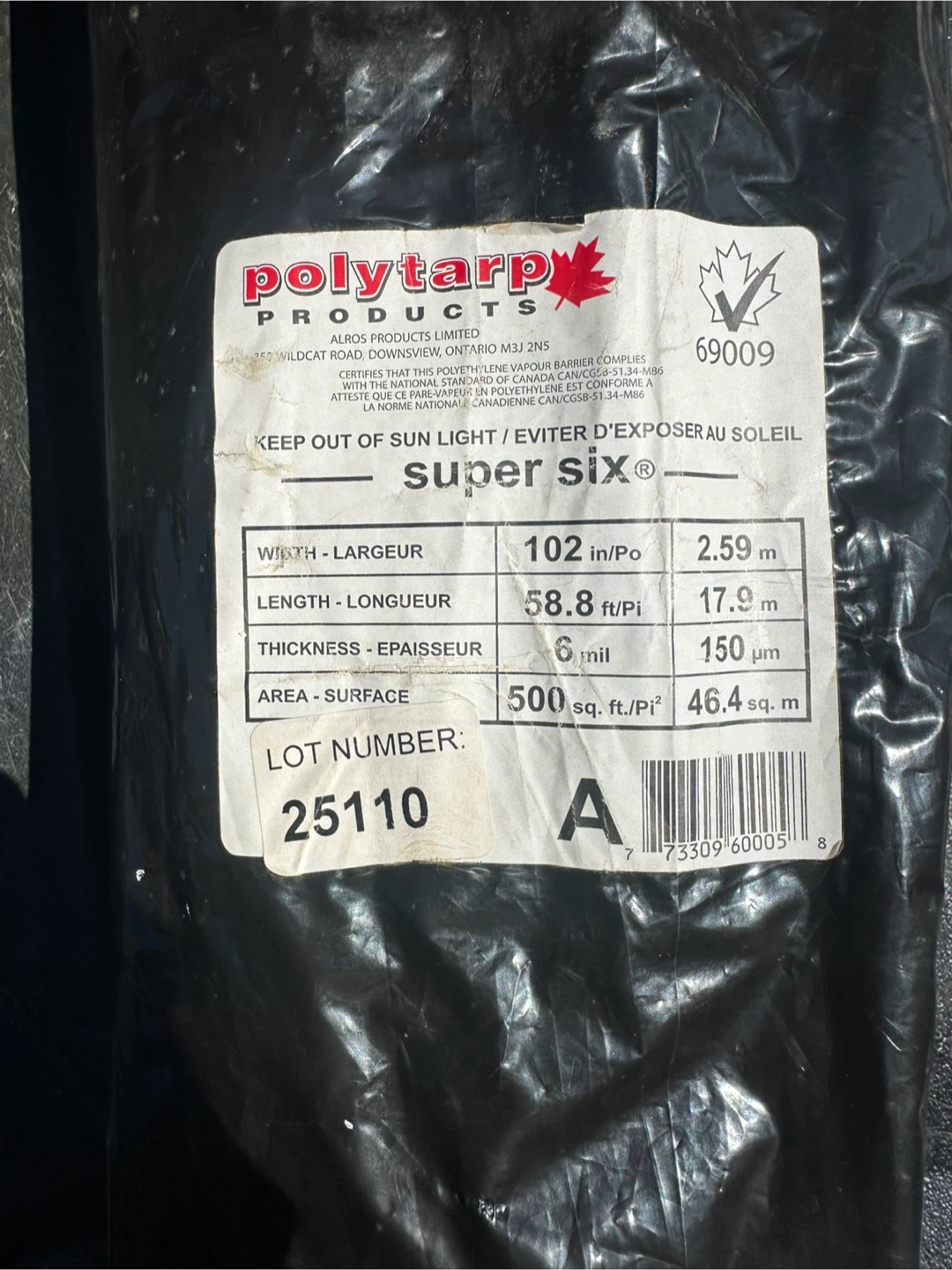 About half roll Polytarp Products Super Six Tarp - 102" x 58.8'