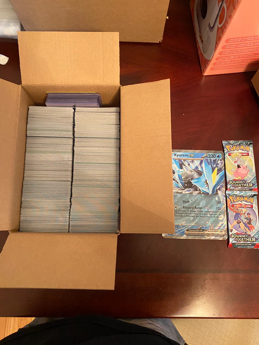 Over 1500 Pokemon cards, 2 Booster Packs & 1 Jumbo Card