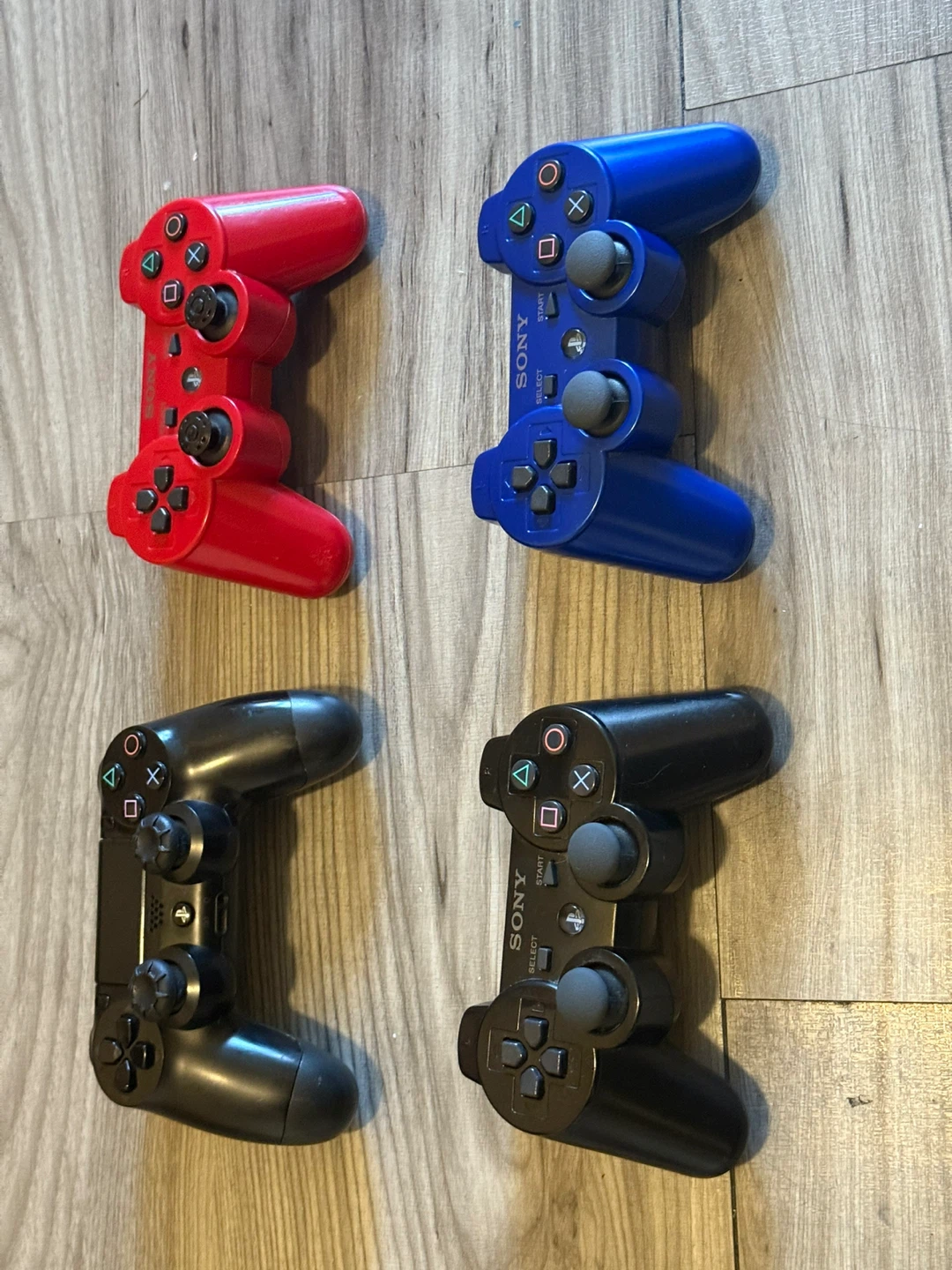Sony PlayStation 3 Controllers - Red, Blue, Black - photo 2