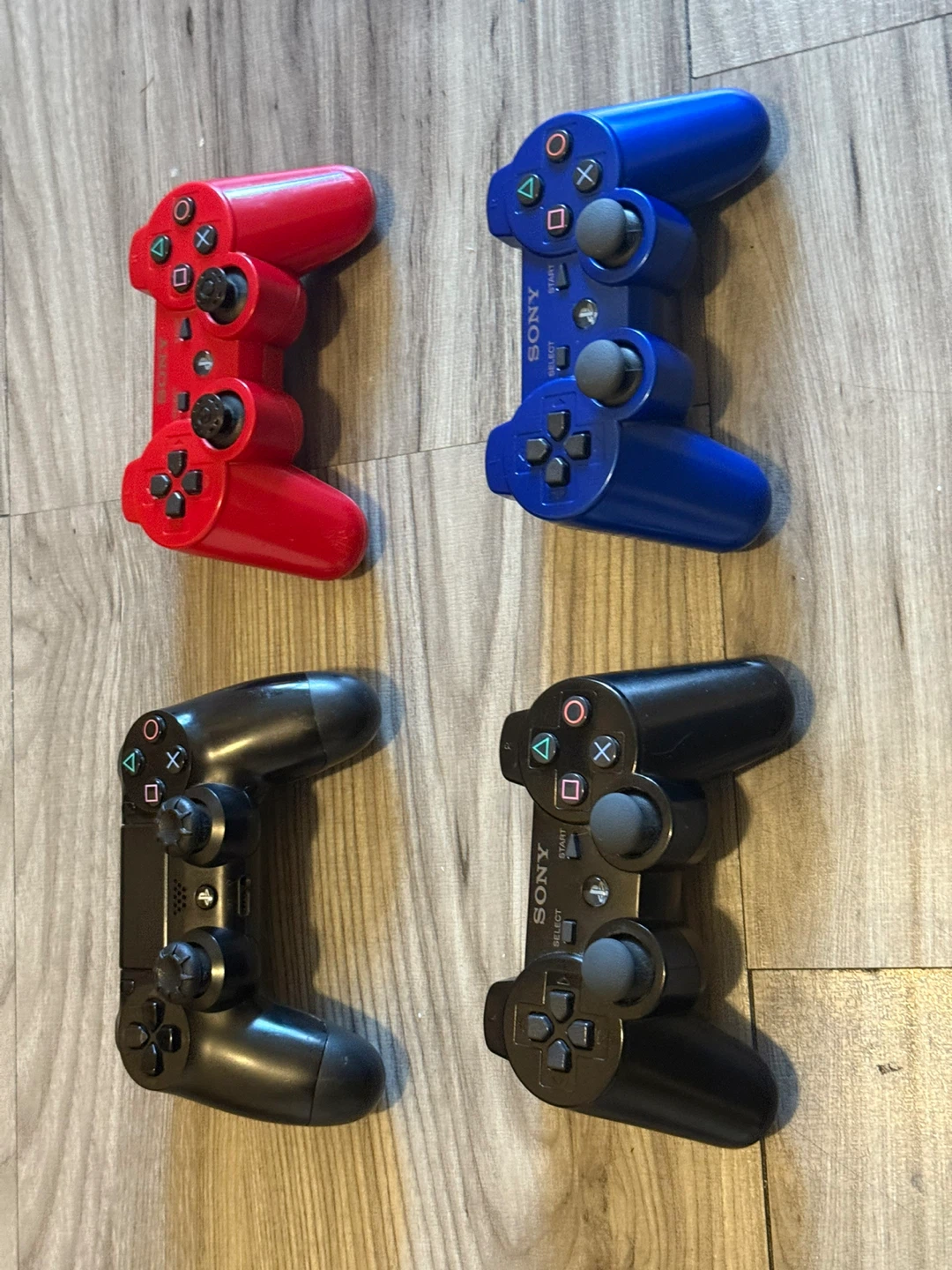 Sony PlayStation 3 Controllers - Red, Blue, Black - photo 3