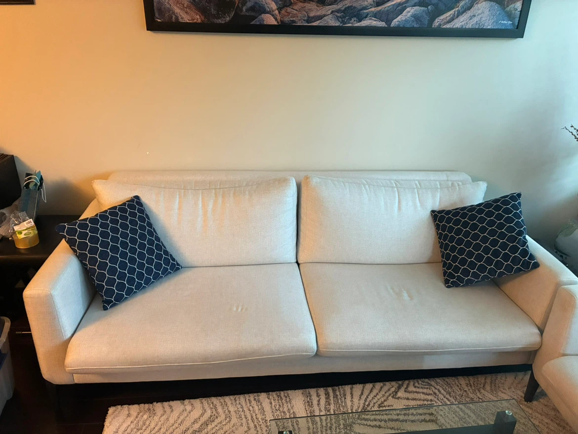 Wide Cream Sofa with Decorative Pillows